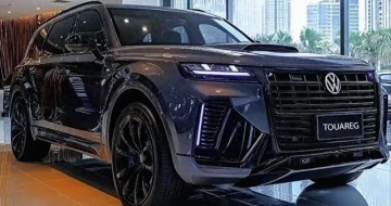 B体育登录入口-大众途锐新车型露面，机械配置拉满却没豪华标，消费者开始算账了